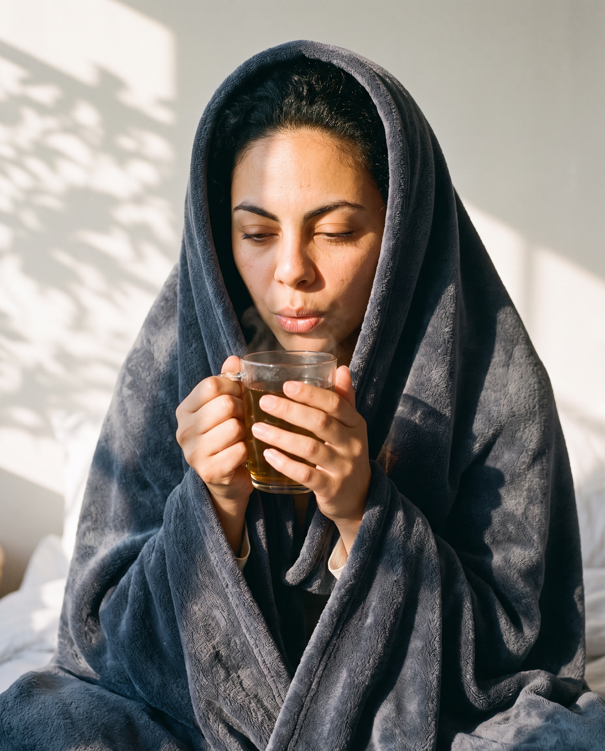 Fleece Blanket — Silver worn as a hood